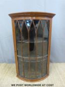 A small astragal glazed corner cupboard,