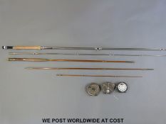 Edgar Sealey Game 2 carbon fly fishing rod together with a J Robertson cane rod and three reels.
