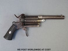 A 7mm six shot pinfire hammer pepperbox revolver with 3.