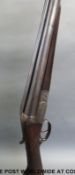Fabrique National 12 bore side by side shotgun with all over engraving,