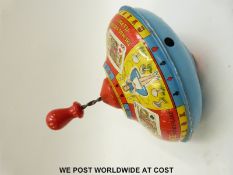 Tri-ang tin plate Alice in Wonderland mechanical spinning top