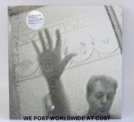 Rare Paul McCartney LP: “Driving Rain” (2001 2xLP with inners). The vinyl appears to be unplayed.