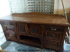 An Art Nouveau mahogany sideboard (W214 x D68 x H110cm)