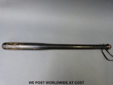 A large ebonised Victorian truncheon with '120' below VR royal cypher in gilt script