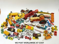 Over 50 Matchbox and other diecast model vehicles including two ERTL large scale tractors