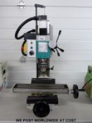 An Axmister model engineer series 5x2 mini mill milling machine,