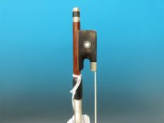 A viola bow with mother of pearl inlay (probably unused).