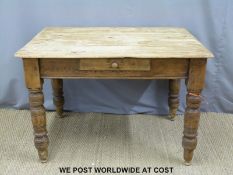 A scrubbed pine table with drawer (W112 x D87 x H74cm)
