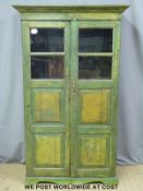 A painted / distressed glazed cabinet (W110 x D46 x H183cm)