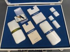 A quantity of mainly perfume related ephemera and promotional material including an attaché case