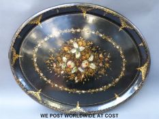 A large mother of pearl inlaid and gilt decorated papier mache tray,