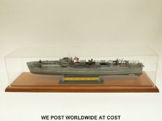 A kit built model boat 'German Fast Attack Craft 5-100 Class' on named plinth in acrylic case