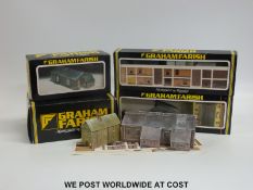 A collection of Graham Farish N gauge buildings, together with a powerbox 300 transformer,