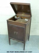 A stand up internal horn gramophone with nickel plated controls and turntable and maker's mark to