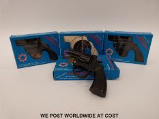 Four FIM Detective Special Hot Air Bullet Cap guns, all in original boxes.