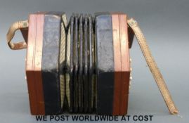 A c1900 Anglo Lachenal concertina with 30 bone buttons,