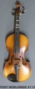 A cased violin labelled Tatra by Rosetti made in Czechoslovakia, 33cm back,