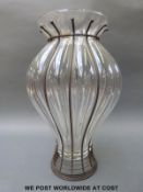 A large lobed glass vase in metalwork frame,