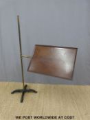 A late 19th/early 20th century adjustable tray on brass pole with cast tripod base