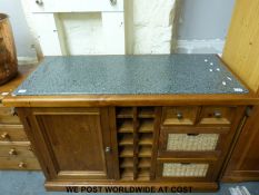 A marble set kitchen island unit with towel rails,