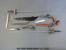 A collection of reproduction/decorative guns,