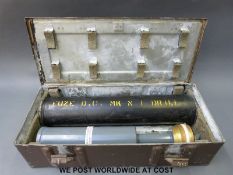 A boxed WWII or later depth charge drill fuse in case with original storage tube,