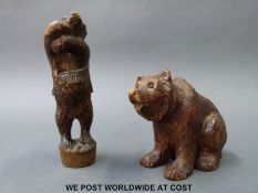 A Black Forest bear and a similar example possibly a pen holder