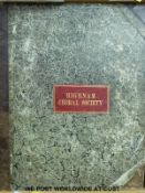 Highnam Choral Society manuscript music book in marbled boards with leather bound corners,