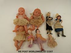 A collection of miniature dolls including bisque examples with impressed marks,
