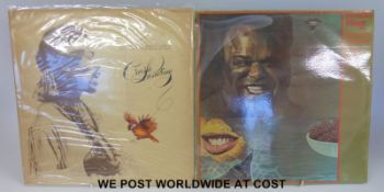 Approximately 40x LPs from the 1960s and 1970s in a good quality metal carrying case.