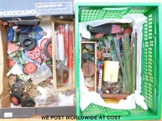 A quantity of vintage Meccano to include gears, chain wheels, angle, segments, wheels,