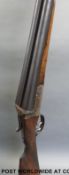 Unnamed 12 bore side by side shotgun with ornate engraving,