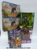 Giant of the Jungle remote control elephant together with a Godzilla action figure,