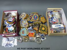 A large collection of United States of America cloth badges including US military and US police