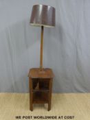 An Art Deco style bookcase/standard lamp and a fire kerb