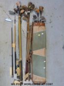 Vintage Marc Charles golf clubs in bag, three vintage woods, hickory shafted irons,
