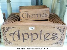 A set of ten wooden vintage style storage/retail boxes with fruit and veg theme,