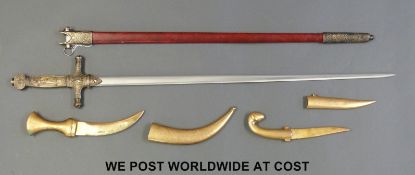 A replica/decorative sword and two gilt Eastern style daggers