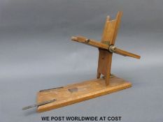 Hardy 1911 model oak line drier with four hinged folding winder arms, turned horn handle,