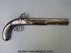 Wogdon London flintlock hammer action duelling pistol with engraved top plate,