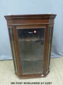 A glazed mahogany corner display cabinet,