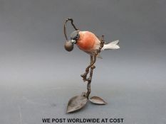 A Royal Worcester study of a bullfinch on a bronze cherry branch