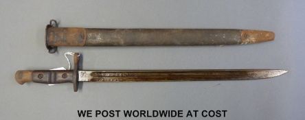 A WWI US Remington bayonet in sheath impressed 1913