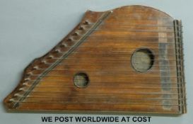 A late 19th early 20th century German zither harp, with 15 steel strings,