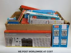 A large collection of Hornby and PECO 00 gauge track, points and accessories, all in original boxes.