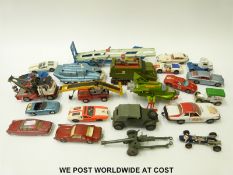 Twenty two Corgi and Dinky diecast model vehicles including gift set models, military vehicles etc.