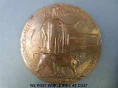 A WWI death plaque to Edward Harold Woolley