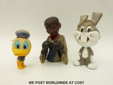A Mohammed Ali boxing action hand puppet together with a mattel pull string Bugs Bunny toy and a