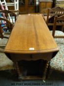 An oak Pembroke table,