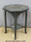 A carved octagonal Anglo Indian ebonised table (D61 x H72cm)